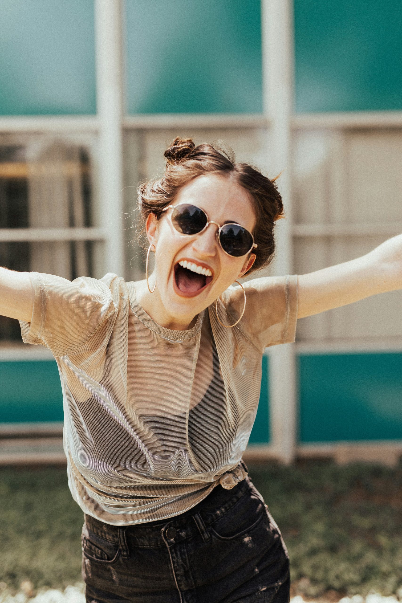 Happy laughing woman wearing sunglasses. Optical store. Prescription glasses. Optician, Optometrist