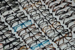 Eyeglass on display on eyeglass travelling case. Optical store. Prescription glasses.