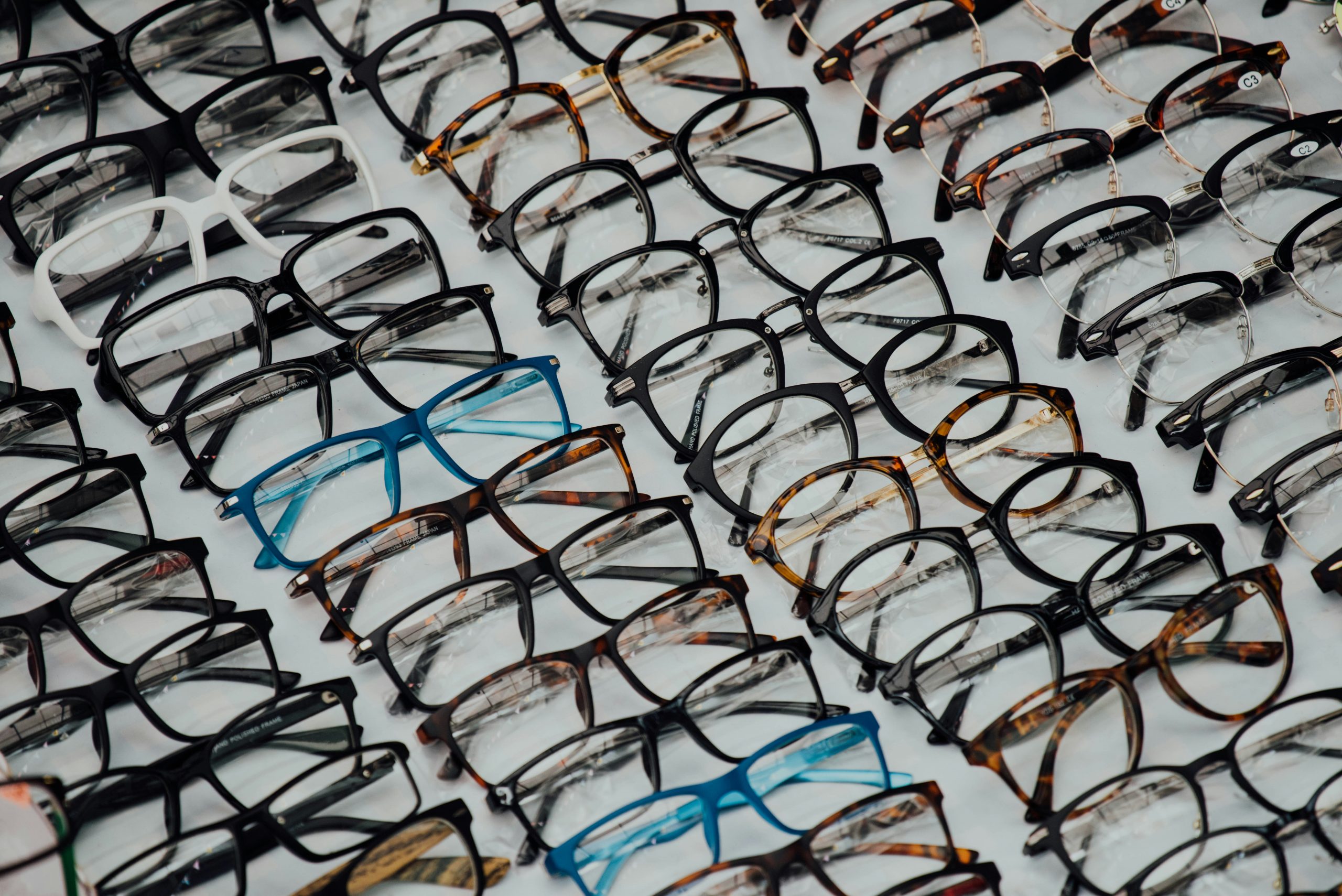 Eyeglass on display on eyeglass travelling case. Optical store. Prescription glasses.