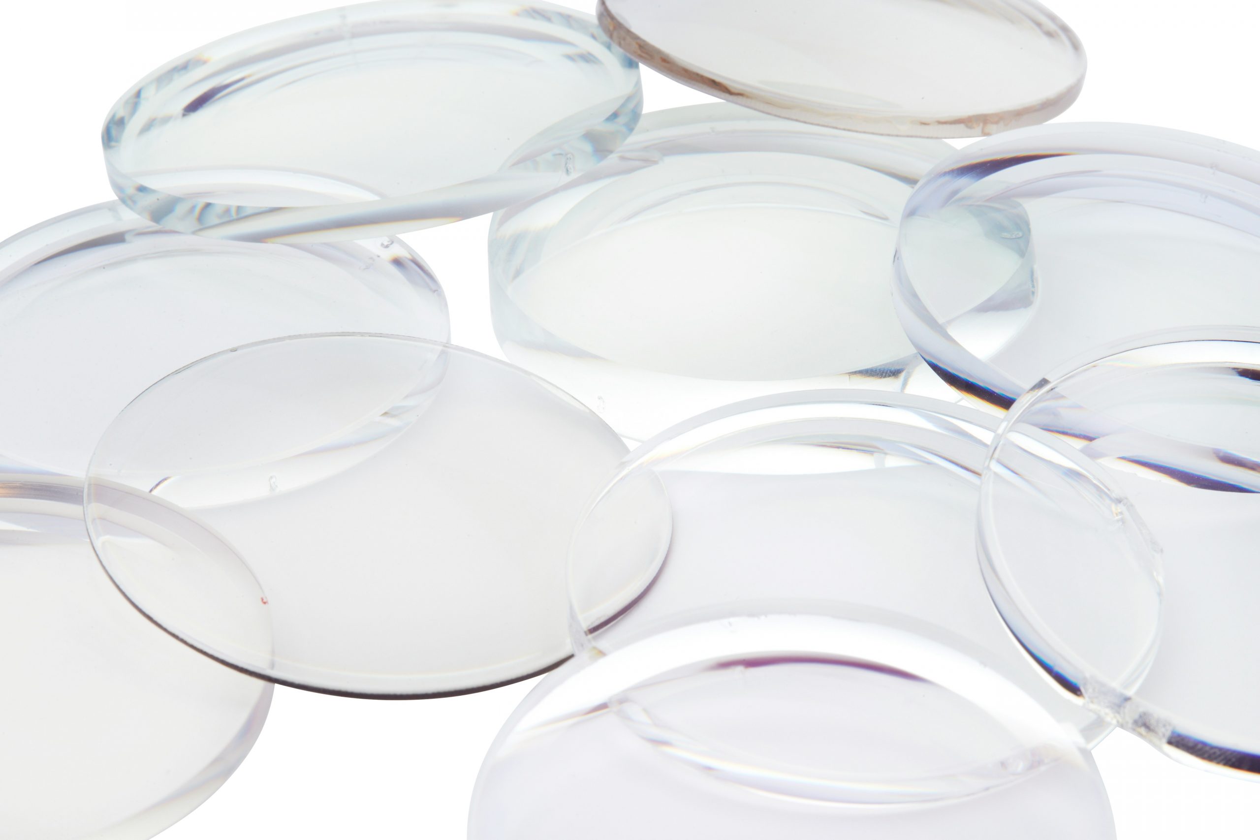 Eyeglass Lens, Uncut eyeglass lens, lens blank. Optical store. Prescription glasses. Optician, Optometrist