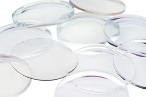 Eyeglass Lens, Uncut eyeglass lens, lens blank. Optical store. Prescription glasses. Optician, Optometrist